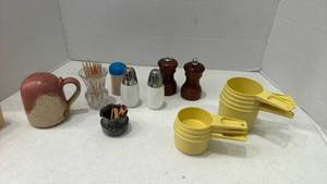 lot 1732 image: Tupperware measuring cups, salt and pepper shakers and more