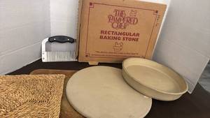 lot 1766 image: The pampered chef baking stone and cheese cutter and more
