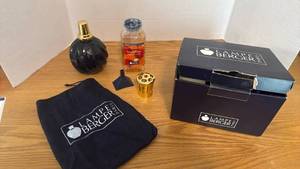 lot 1802 image: Lampe Berger Paris black glass fragrance lamp