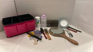 lot 1901 image: Avon makeup caddy, mirrors, combs and brushes and more