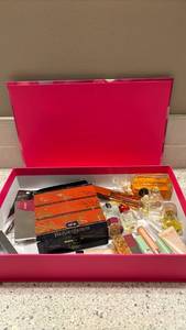 lot 1902 image: Clinique box with  Fragrances, makeup and more