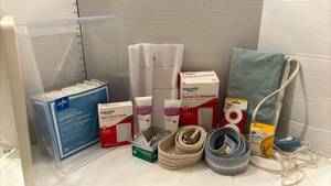 lot 1906 image: Heating pad, two gait belts, first aid supplies
