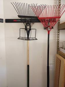 lot 2011 image: 2 Rakes and a Hose Holder