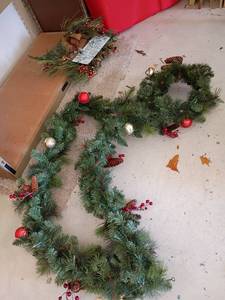 lot 2013 image: Christmas Decor.  Approximately 8ft. Garland and 14in. Wreath.  With Christmas Tote