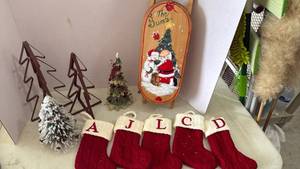 lot 2104 image: Decorative sled, trees and small stockings