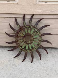 lot 3104 image: Large Cast Iron Rotary Hoe Wheel with Weathered Green Paint 19 in