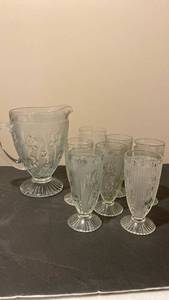 lot 1980 image: Glass pitcher and water glasses in iris design, matches lots 1978, 1979