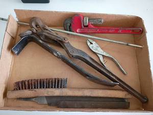 lot 2213 image: Miscellaneous Tools.  Wire Brush, Crow Bar, Pipe Wrench, Boomer and More