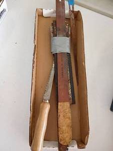 lot 2215 image: Various Saw Blades and a Small Hand Saw