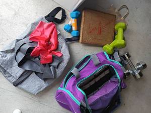 lot 2263 image: Fila Gym Bag with Ankle Weights.  Also Stretch Bands, Hand Weights and a Vintage Twist Trimmer