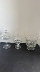 lot 2310 image: Fostoria American lidded candy dishes, and glass footed compote bowl