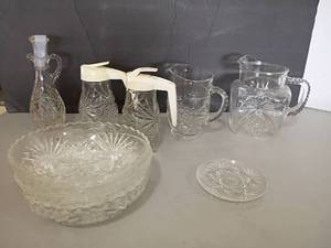 lot 2433 image: Prescut Depression Glass Star of David  7 12in. Bowls, Pitchers, Syrup and Vinegar Holders