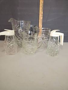 lot 2435 image: Prescut Depression Glass Star of David  3 Pitchers and 2 Syrup Holders