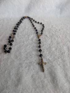 lot 1513 image: Black Glass Bead Catholic Rosary with Gold Tone Cross