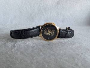 lot 1520 image: KODAK Olympic Commemorative Watch with Black Leather Strap