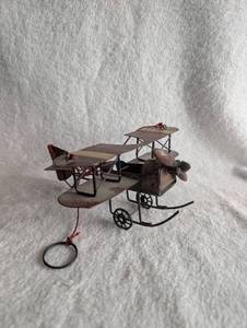 lot 2503 image: Metal Biplane Model with Propeller