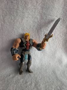 lot 5011 image: He-Man Action Figure with Power Sword