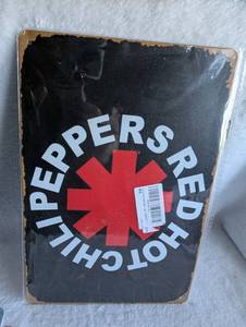 lot 5601 image: Red Hot Chili Peppers Metal Sign