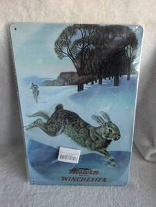 lot 5603 image: Western Winchester Metal Tin Sign with Rabbit Winter Scene