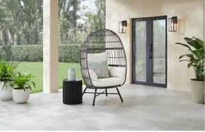 lot 15905 image: Hampton Bay Breezy Bay Gray Wicker Outdoor Egg Chair with CushionGuard Almond Cushions - Retail $299