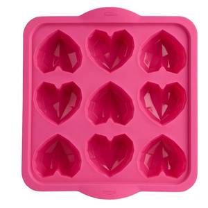 lot 38089 image: Trudeau Structured Silicone Cavity Diamond Heart Shaped Cupcake Baking Pan Pink