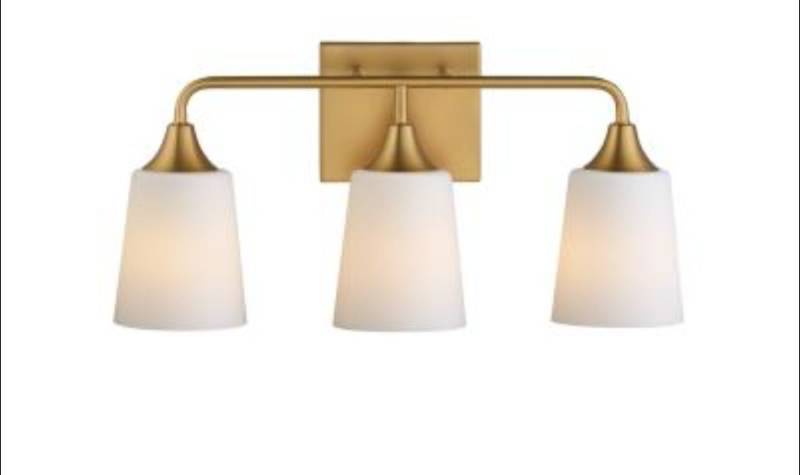 lot 15758 image: Hanaloa Brass Three Light Bathroom Vanity Light Fixture, Aged Brass - Retail $85