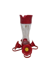 lot 38775 image: Red Glass Hummingbird Feeder with Flower Base