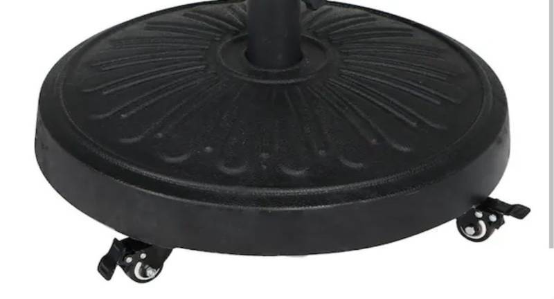 lot 15966 image: StyleWell 50 lbs. Concrete and Resin Patio Umbrella Base in Black (Does not include umbrella pole and tightening rods) Retails $64