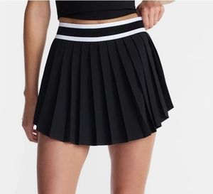 lot 41217 image: Black Pleated Tennis Skirt with White Stripe Waistband Size XS