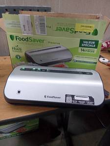 lot 42060 image: FoodSaver Preserve Vacuum Sealer, 14-Piece Starter Kit, Vacuum Seal Roll & Bags
