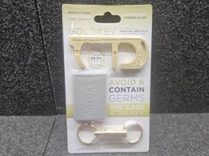 lot 592 image: GoldKey Antimicrobial Copper Hand Tool Stylus White Containment Case Key Chain