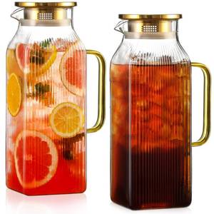 lot 21951 image: 2 Pack 2 Liter68 oz Square Glass Pitcher with Lid, Classic Stripes Water Pitchers with Handle for Fridge, Large Jug for Iced Tea, Coffee, Borosilicate Glass Carafe for HotCold Brew Drink, Gold - Retail $34