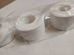 lot 29646 image: White Athletic Sports Tape Rolls, 4 Rolls - Retail $8