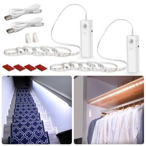 lot 44216 image: WOBANE Motion Sensor Stair Strip Lights,Rechargeable Motion Activated Closet Light,Battery Powered LED Strip,60 LEDs Homelife Bar for Bed,Pantry,Counter,Night Light,Cabinet,6000K White,6.56ft,2PCS - Retail $26