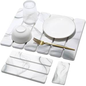 lot 44269 image: Small Stone Dish Drying Mat for Kitchen Counter, 2 PCS 16x12 & 8x4 Quick Dry Stone Mats, Foldable Water Absorbing Diatomaceous Earth Drying Dish Pad for Countertop Bottle Utensil Cup(White Gray) - Retail $30