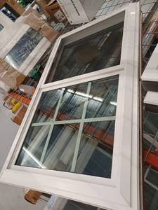 lot 12899 image: Window World 27 34 x 45 34 White Exterior and Wood Grain Interior Vinyl Window With Top Grid
