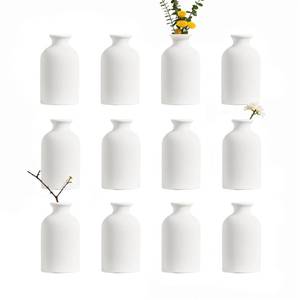 lot 19470 image: LIZOFER Modern White Small Ceramic Vase Set of 12 for Living Room Bedroom 4.72 Minimalist Fresh Flower Vases for Home Decor Office Centerpieces Fireplace Nordic Style Gift for Fake Plant 12 Pack