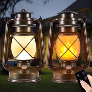 lot 922 image: Battery-Powered 2 Modes Lighting LED Vintage Lanterns Decorative Outdoor & Indoor, 2 Pack Bronze Lights with Dancing Flame, Waterproof Remote Control Retro Lanterns Decor for Room,Garden,Porch - Retail $32