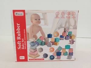 lot 12180 image: Alaire Soft Rubber Baby Set