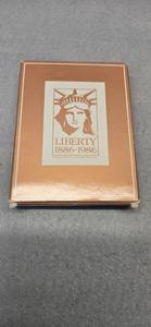 lot 429 image: 1986 Statue of Liberty Centennial Commemorative Brass Stamp Plaque