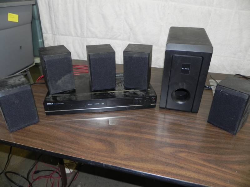 lot 10512 image: RCA DVD Player with Dynex surround Sound
