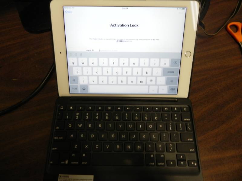 lot 10543 image: Apple Ipad with Cover and Keyboard. Works Great, Parts Only