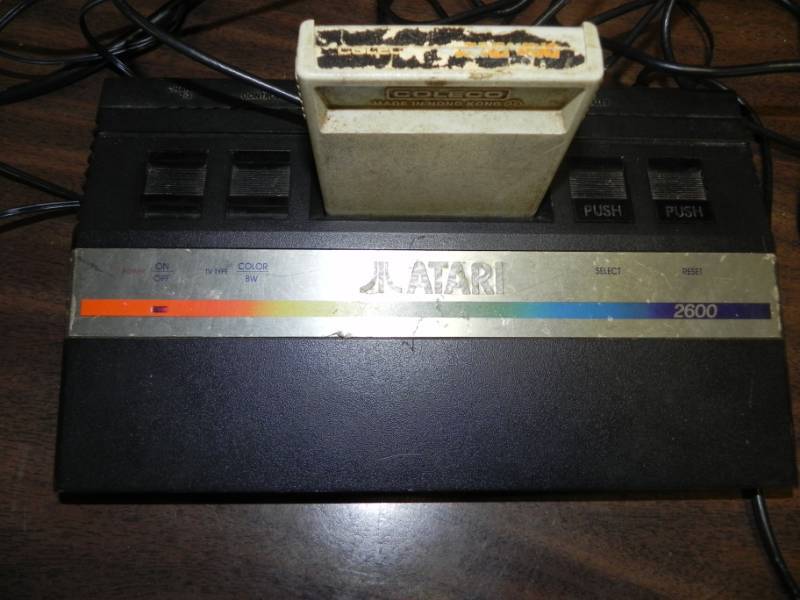 lot 10544 image: Vintage Atari Game console with Controllers and Games