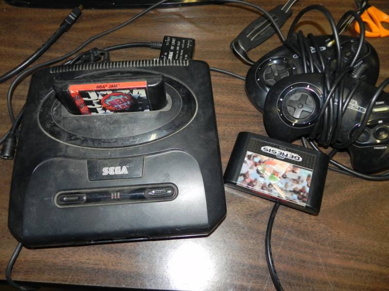 lot 10545 image: SEGA Game System with Games and Controllers