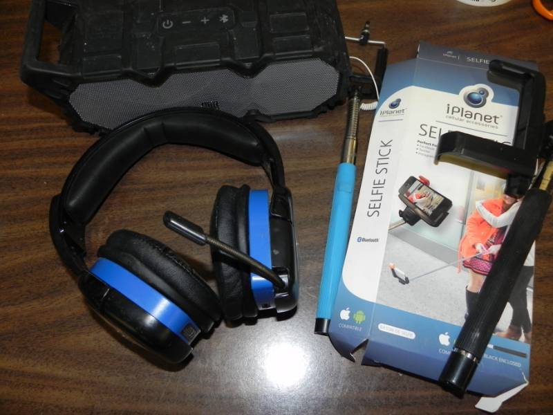 lot 10573 image: AfterGlow Headphones, Selfie Stick. Bluetooth Speaker