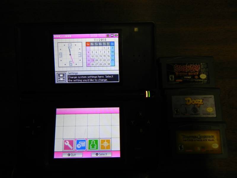 lot 10575 image: Nintendo DS Lite with Games