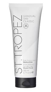 lot 1732 image: St.Tropez Gradual Tan Firming Lotion, Medium to Dark Sun Kissed Glow Self Tan Moisturizer, with Hyaluronic acid and antioxidants, Streak-Free, Vegan, Natural & Cruelty-Free, 6.7 FL OZ - Retail $29