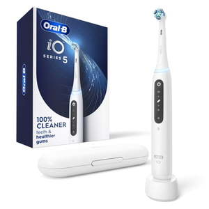 lot 5136 image: Oral-B Toothbrush  iO Series 5 Electric Toothbrush with (1) Brush Head  Rechargeable  White - Retail $140
