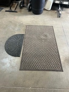 lot 22512 image: 2 Misc. Brown Outdoor Rugs