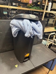 lot 26371 image: Trash Can w Misc. Linens
